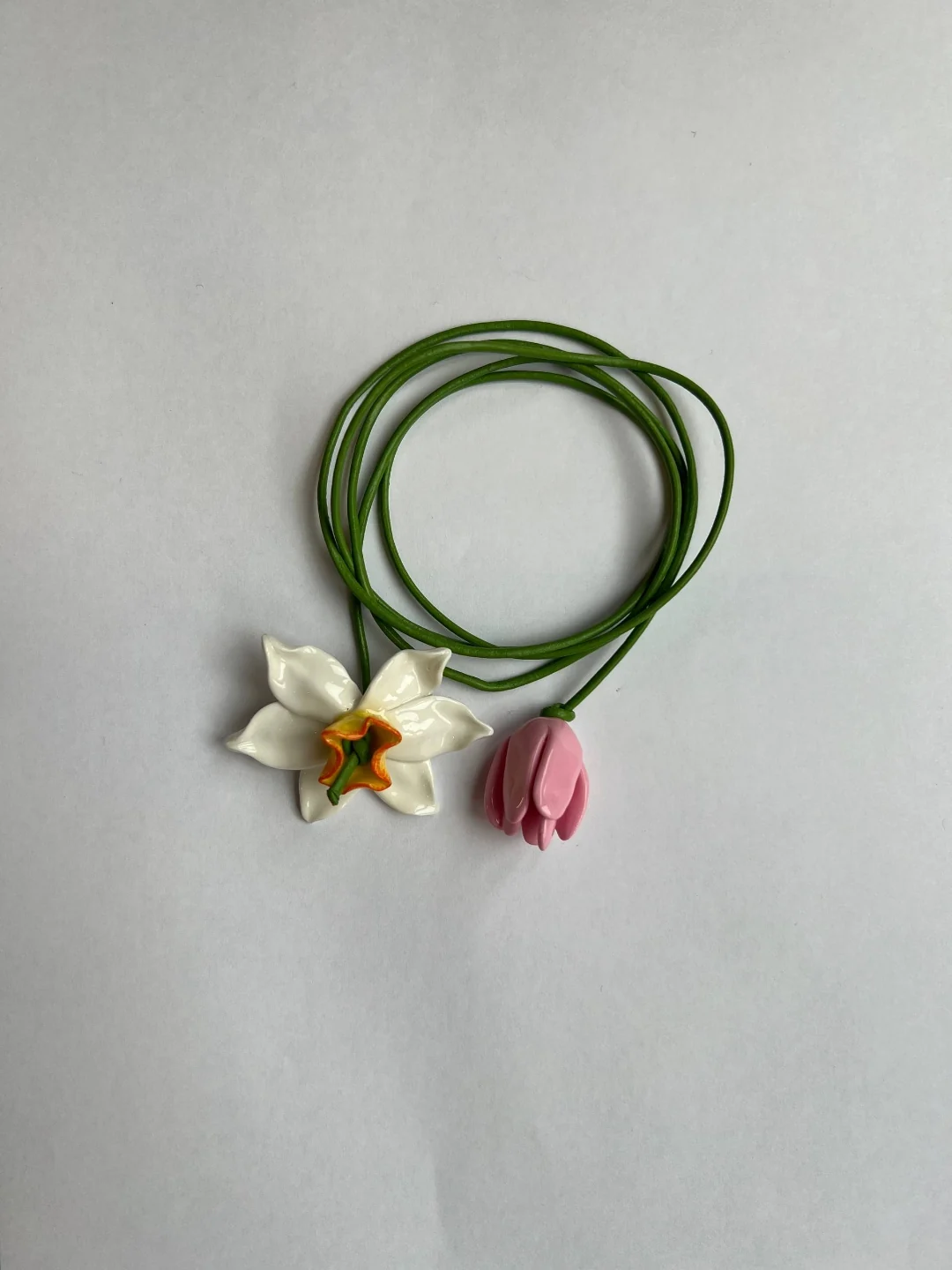The same pendant, shot on a phone